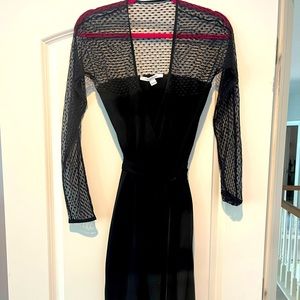 DVF wrap dress in black knit with upper mesh detailing